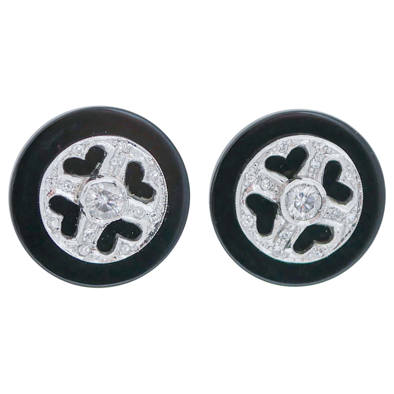 Boucles d'oreilles en onyx, diamants, platine et or blanc 14 carats.