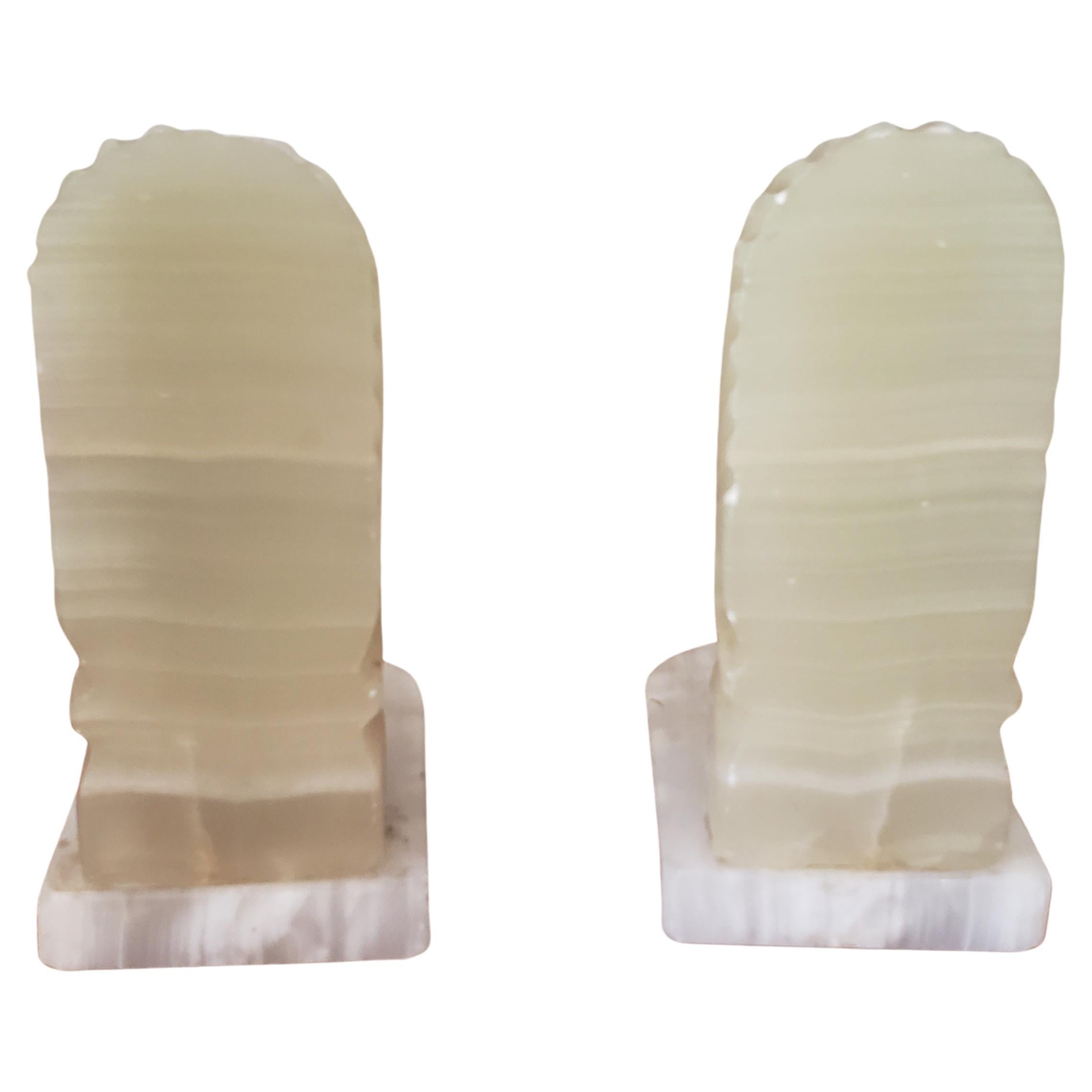 Fantastic pair of Onyx figural bookends. Measure 5