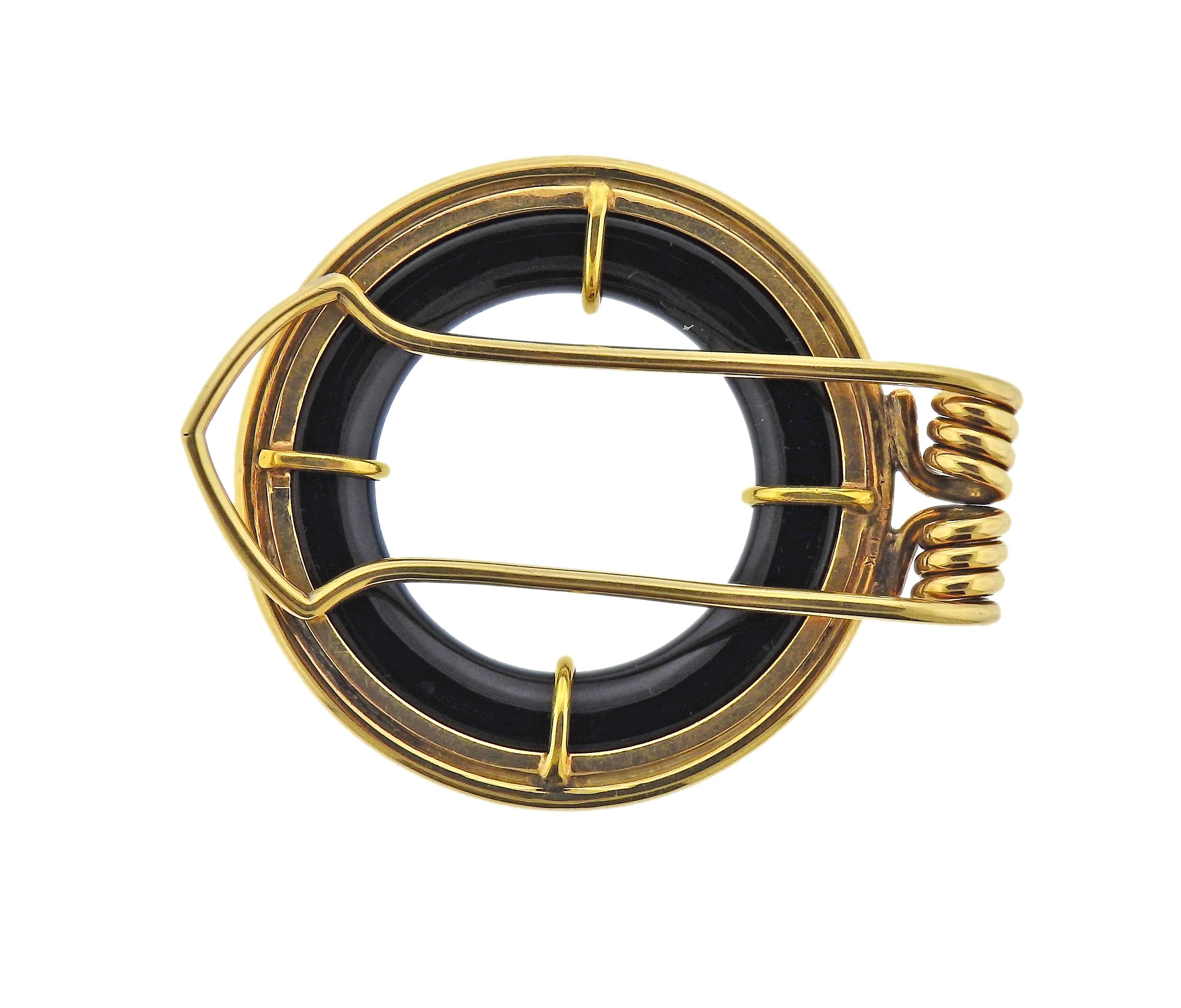 14k gold onyx clip. Measuring 45mm in diameter x 53mm long. Marked 14k. Weight - 24.2 grams.