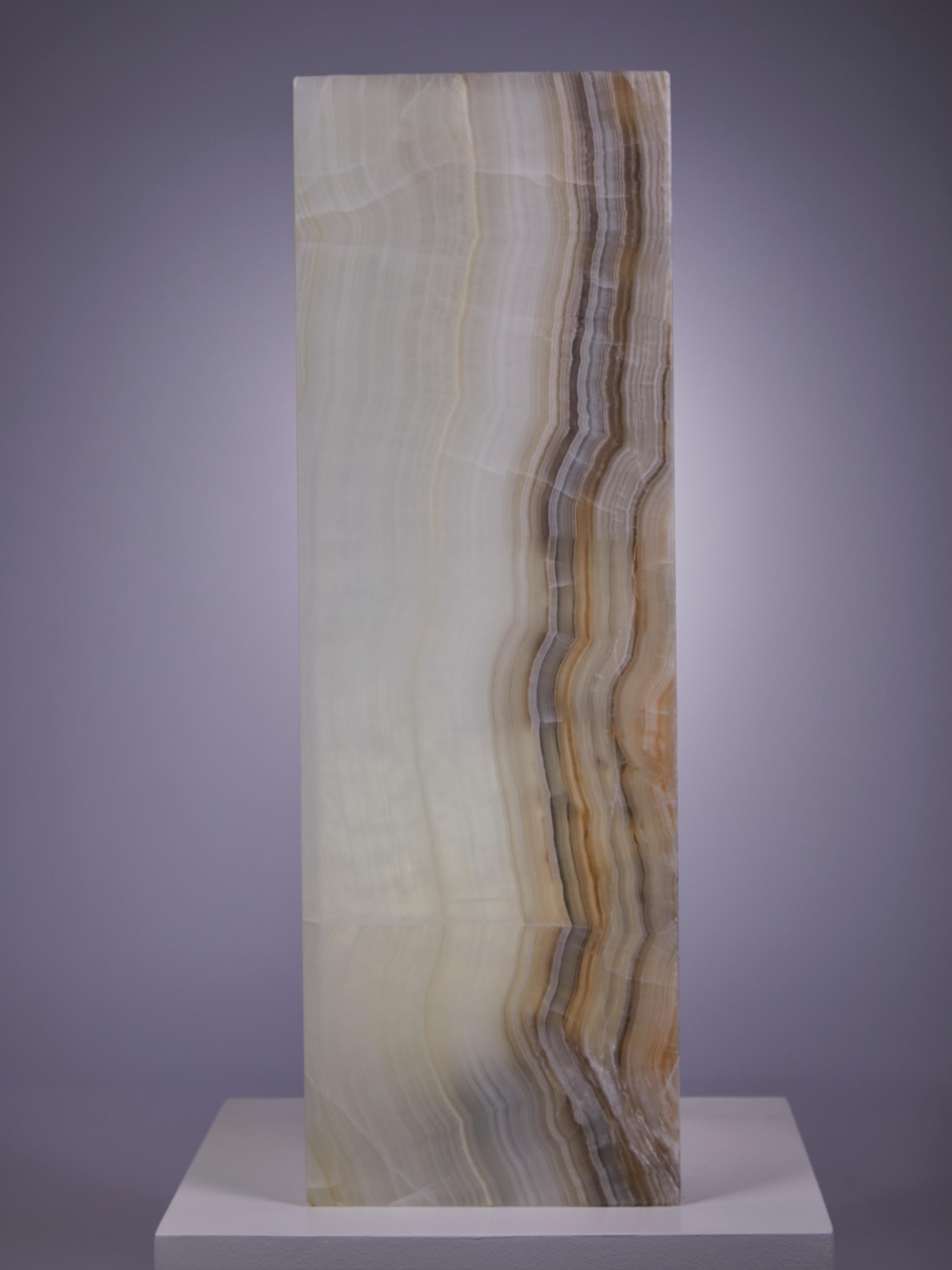 Beautiful lamp, carved from a block of translucent Mexican banded onyx.


