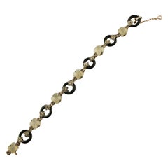 Onyx, Moonstone, Rubies, Diamonds, 9 Karat Rose Gold and Silver Link Bracelet