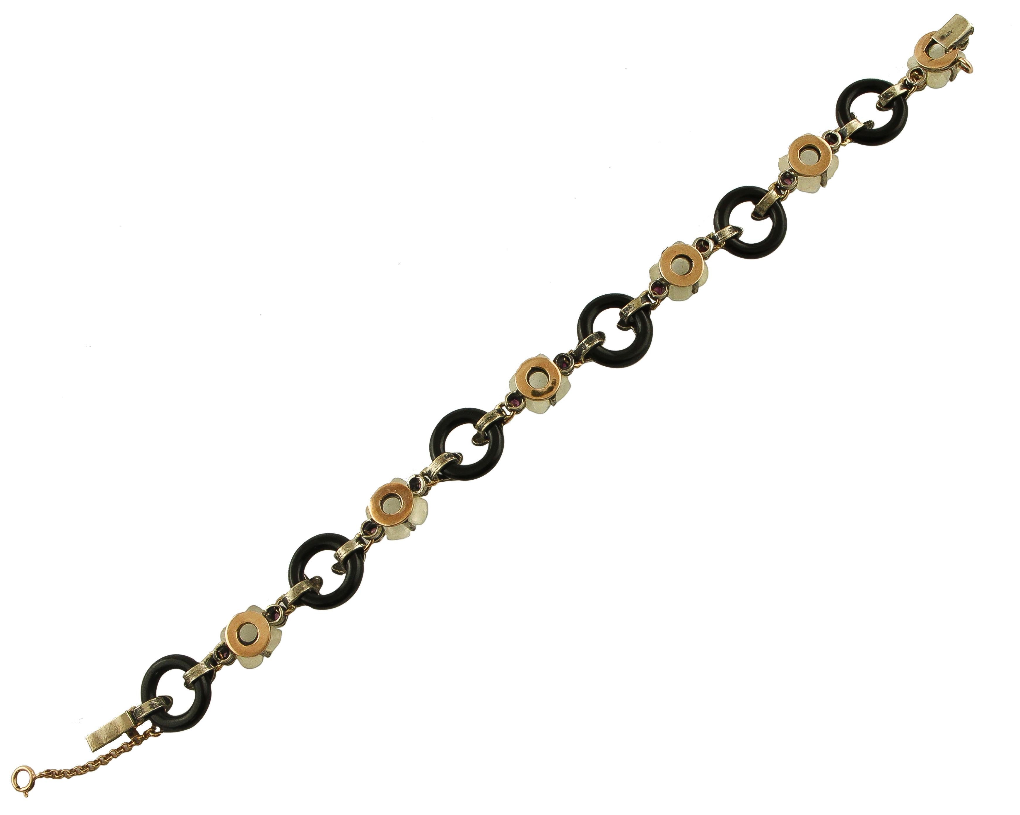 Mixed Cut Onyx, Moonstone, Rubies, Diamonds, 9 Karat Rose Gold and Silver Link Bracelet For Sale