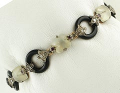Onyx, Moonstone, Rubies, Diamonds, 9 Karat Rose Gold and Silver Link Bracelet