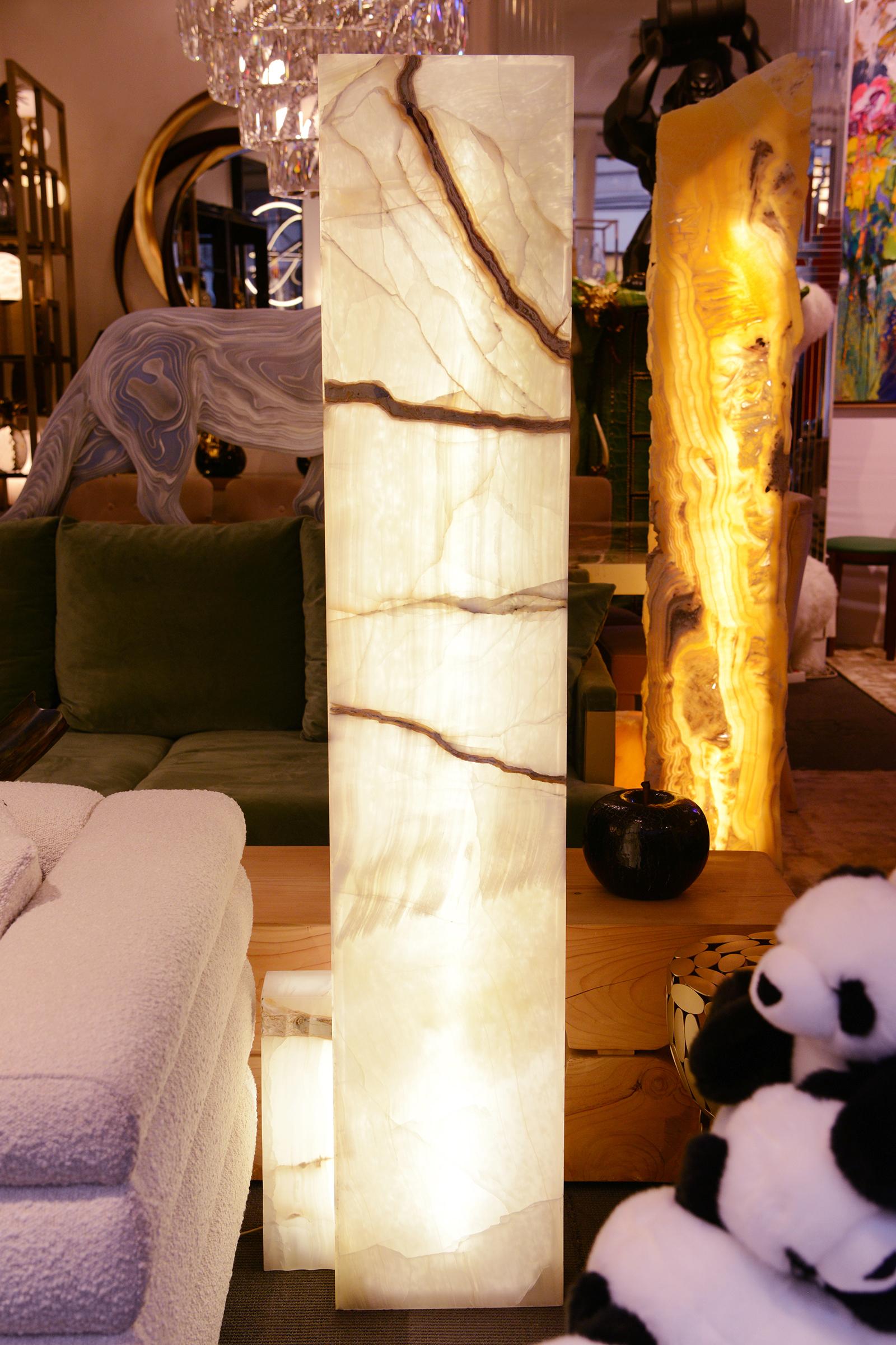 Floor Lamp Onyx Polished Totem with all structure in pure onyx,
carved piece in polished finish. Including LED lighting system with
a plug, exceptional and unique piece.
Also available in custom sized table lamps, sculptures, furnitures,
on request.