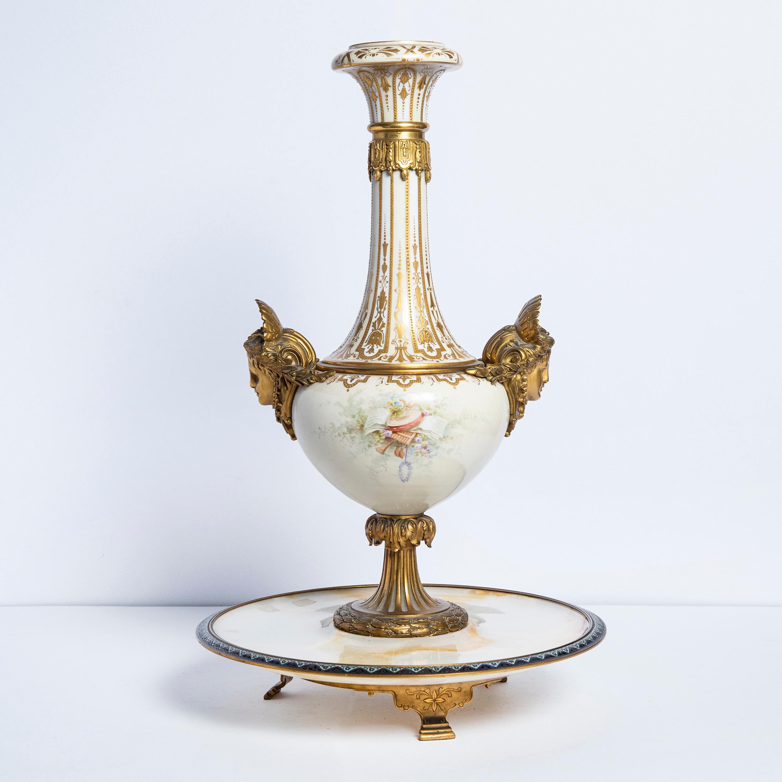 Onyx, porcelain, gilt bronze and cloisonnè Sevres center. Neoclassical Style. France late 19th century.