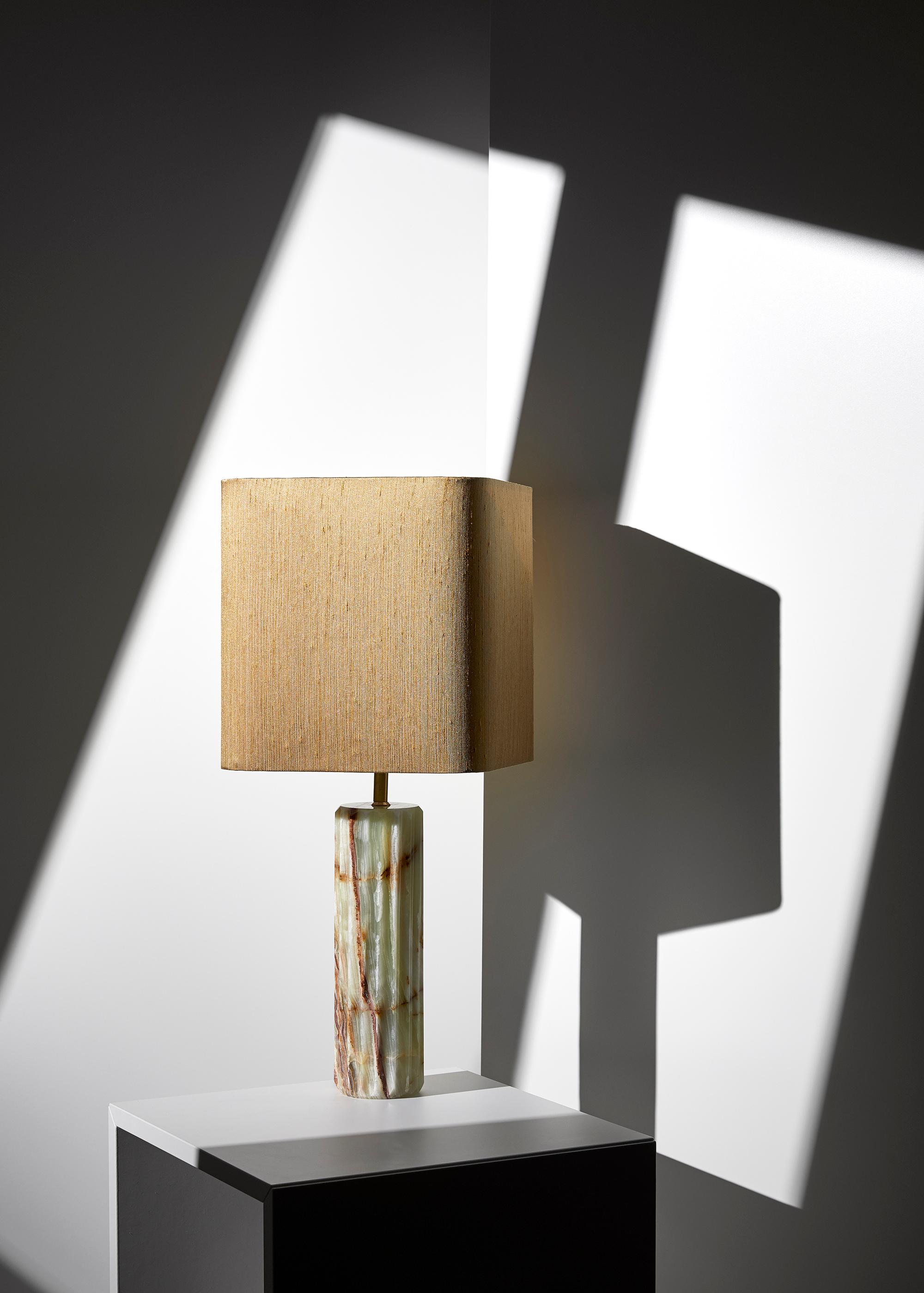 Onyx Proud Table Lamp by Lisette Rützou
Dimensions: 25 x H 55 cm
Materials: Onyx

All our lamps can be wired according to each country. If sold to the USA it will be wired for the USA for instance.

 Lisette Rützou’s design is motivated by an urge
