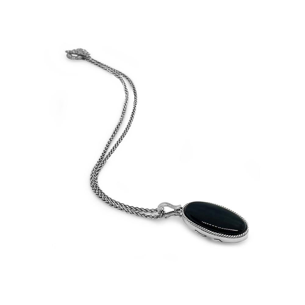 Indulge in opulent elegance with the Black Onyx Reversible Necklace in Sterling Silver, a breathtaking masterpiece by Stephen Dweck. Meticulously crafted to perfection, this luxurious necklace boasts the timeless beauty of black onyx, exquisitely