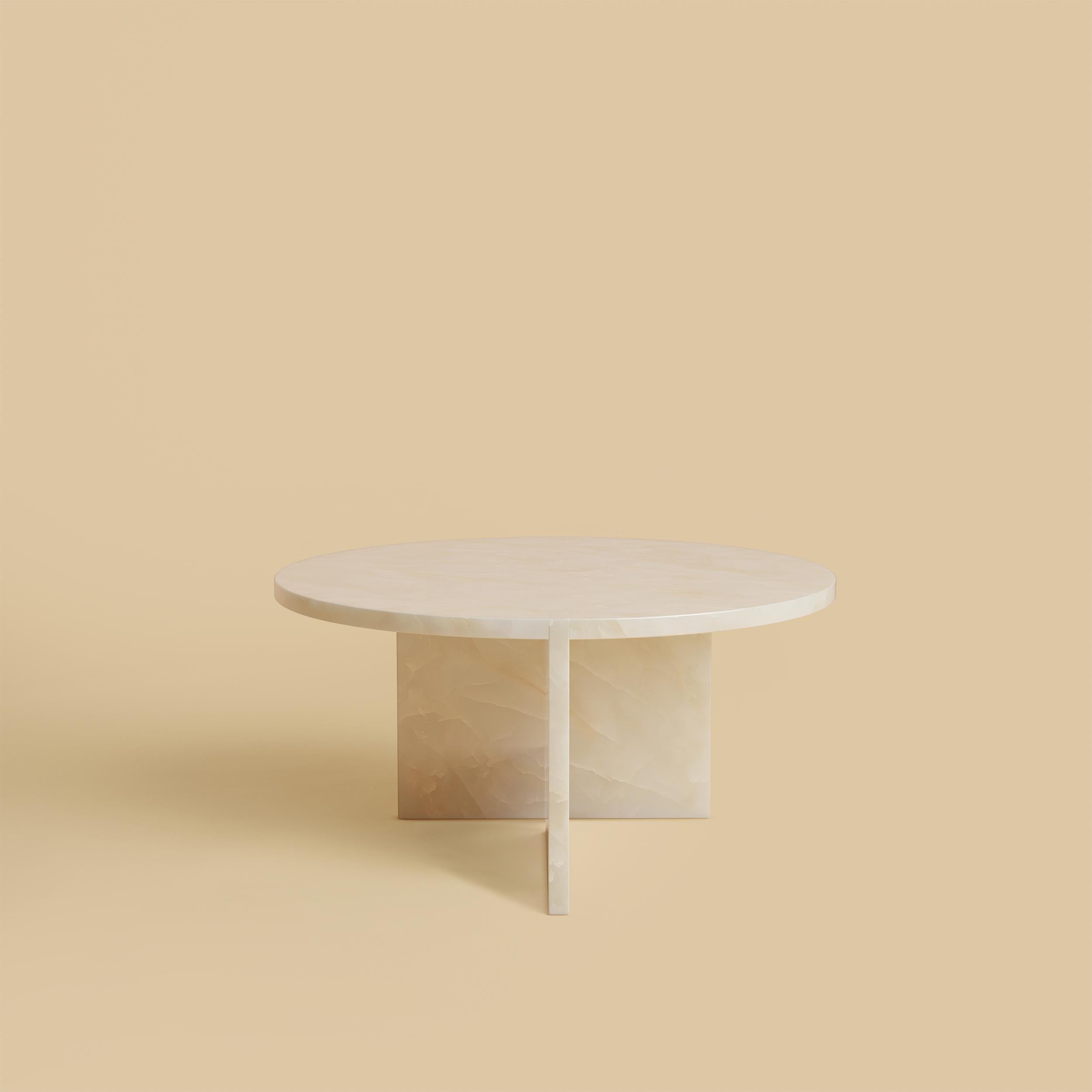 The Hashi coffee table is made entirely of luxury white onyx. The top is circular and 60 cm in diameter, the legs are made from two marble boards in which one part is inlaid on the top as a very elegant detail.
Artisanal production made of