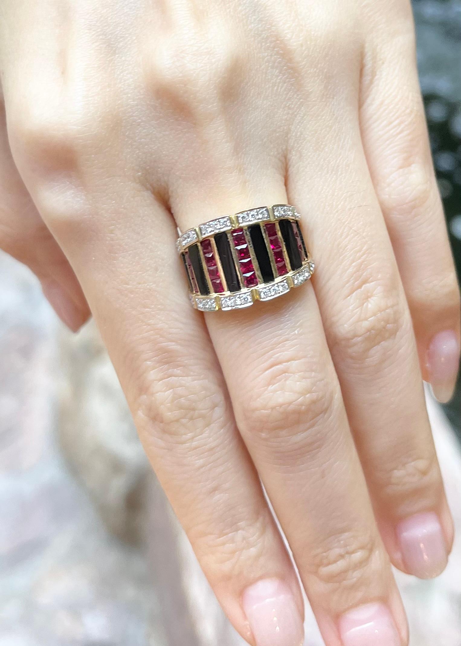 Contemporary Onyx, Ruby and Diamond Ring set in 18K Gold Settings For Sale