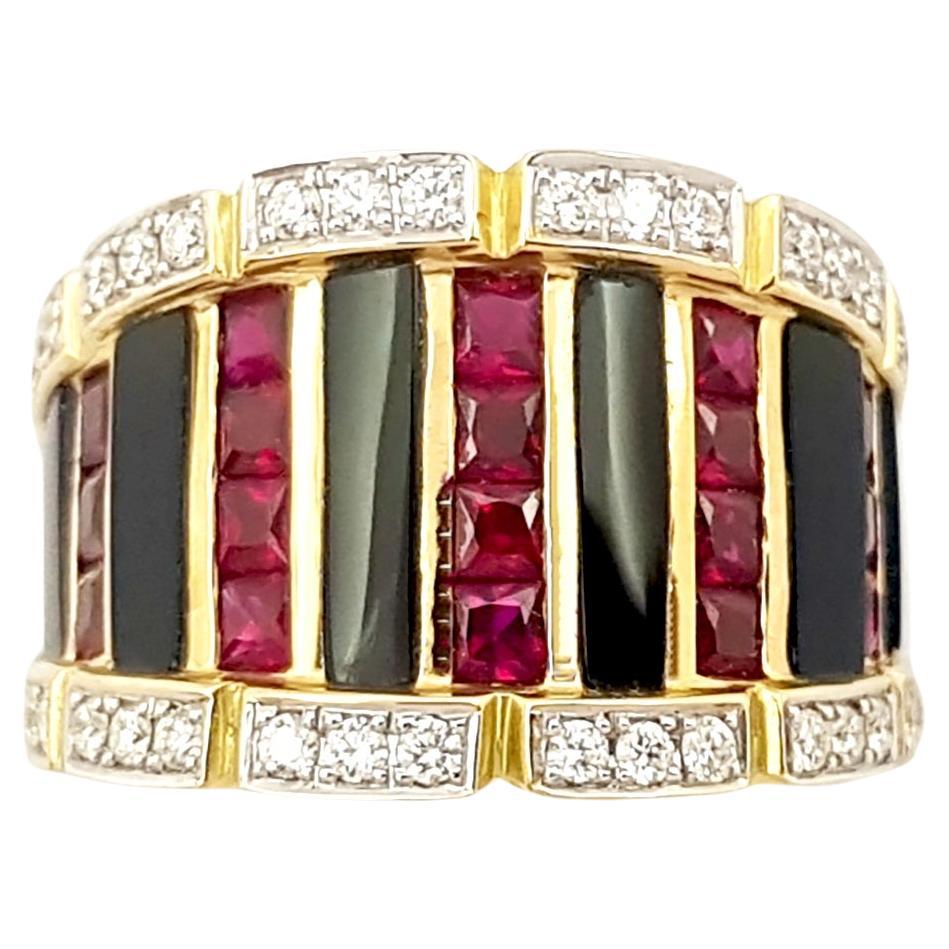Onyx, Ruby and Diamond Ring set in 18K Gold Settings
