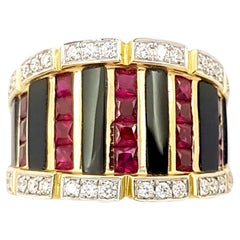 Bague en or 18 carats avec onyx, rubis et diamants