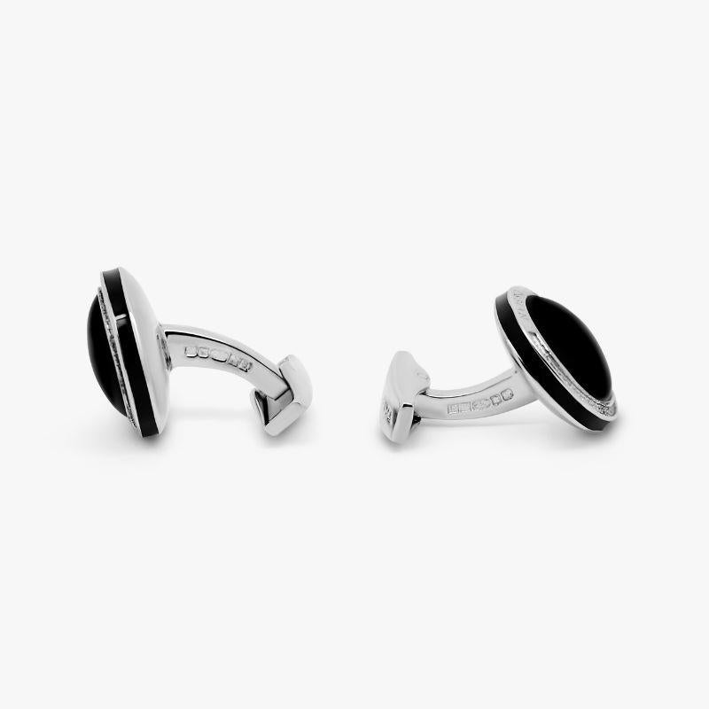Onyx Signature Round Cufflinks in Sterling Silver

Smooth black onyx domes sit within our round, rhodium plated sterling silver frame, with an engraved diamond pattern and black-coloured enamel edge to accentuate the beauty of each semi-precious