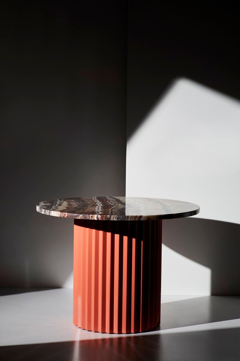 Onyx table 60 by Lisette Rützou
Dimensions: D 60 x H 41 cm
Materials: Brass column with Marble tabletop
Also available Ø 40

 Lisette Rützou’s design is motivated by an urge to articulate a story. Inspired by the beauty of materials, form and