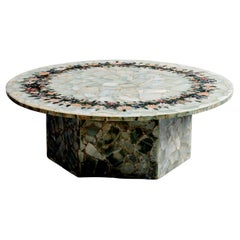 Mesa de ónice con mosaico floral de piedra