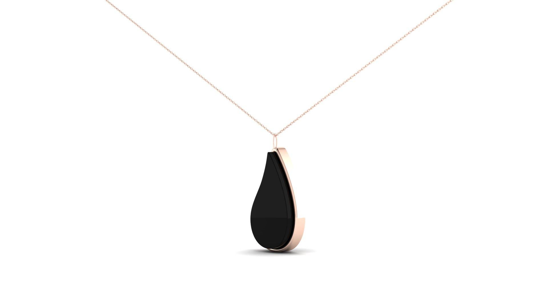 Our signature hand cut black onyx stone with rose gold showcased on an 18kt gold chain.
Worn close to the heart, our signature black onyx stone pendant in rose gold on a delicate 18 karat gold chain is the crown piece of the Sarah Ventura