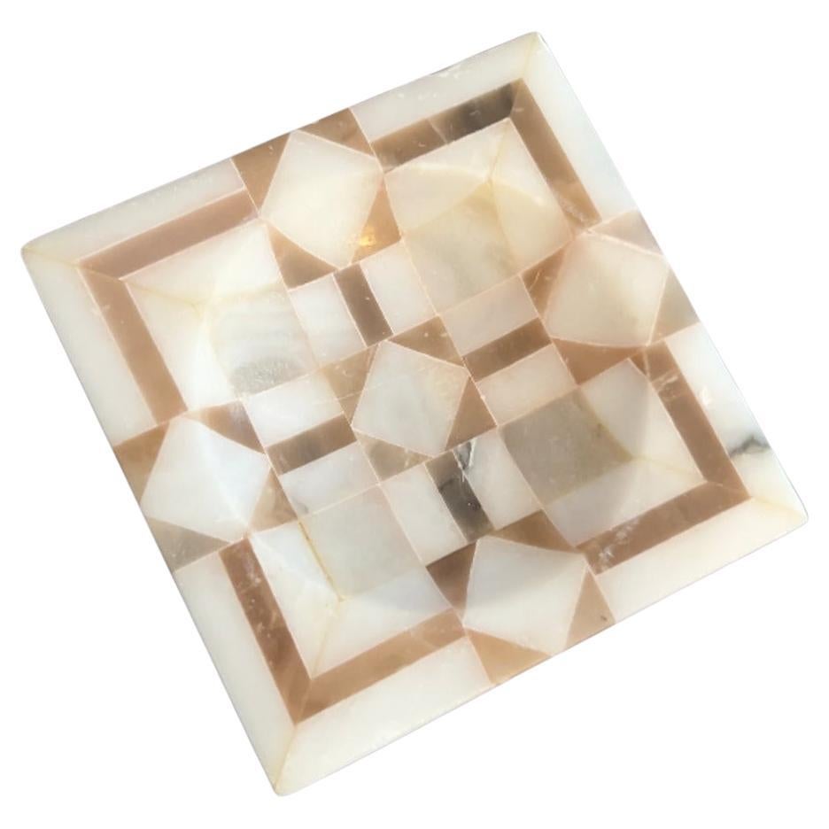 A lovely small square bowl - the piece is inlay with different colored of onyx creating a very interesting pattern.  The concave center makes it perfect for a catch all of change or rings..

A compliment to any side table, entry table or for use on