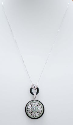 Onyx, Tsavorite, Diamonds, Rock Crystal, 14 Karat White Gold Pendant.