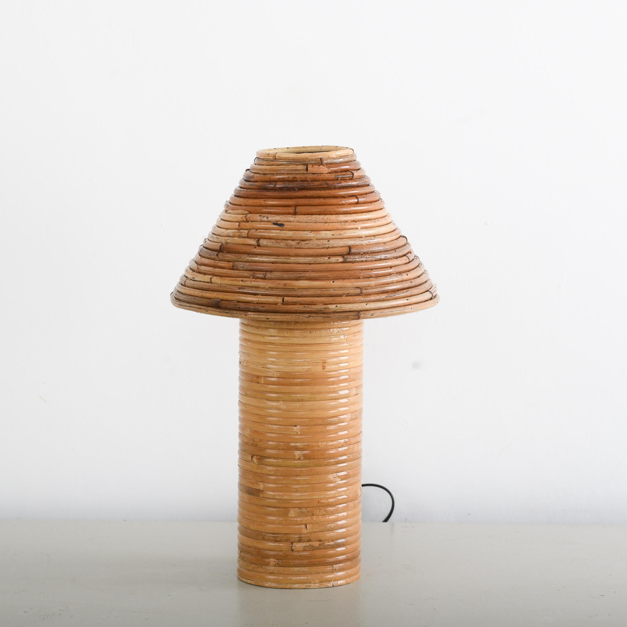 A compact, eco-friendly lamp crafted from natural rattan, offering a warm, textured aesthetic perfect for cozy spaces. Its small size fits effortlessly on desks, shelves, or bedside tables. 

Features an E27 socket for versatile bulb options, paired