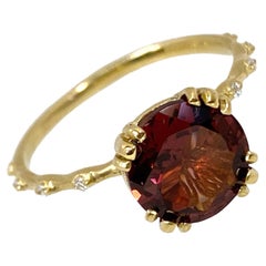 "Oops" Solitaire with 2 Carat Rhodolite Garnet & 10 Tiny Diamonds in Yellow Gold