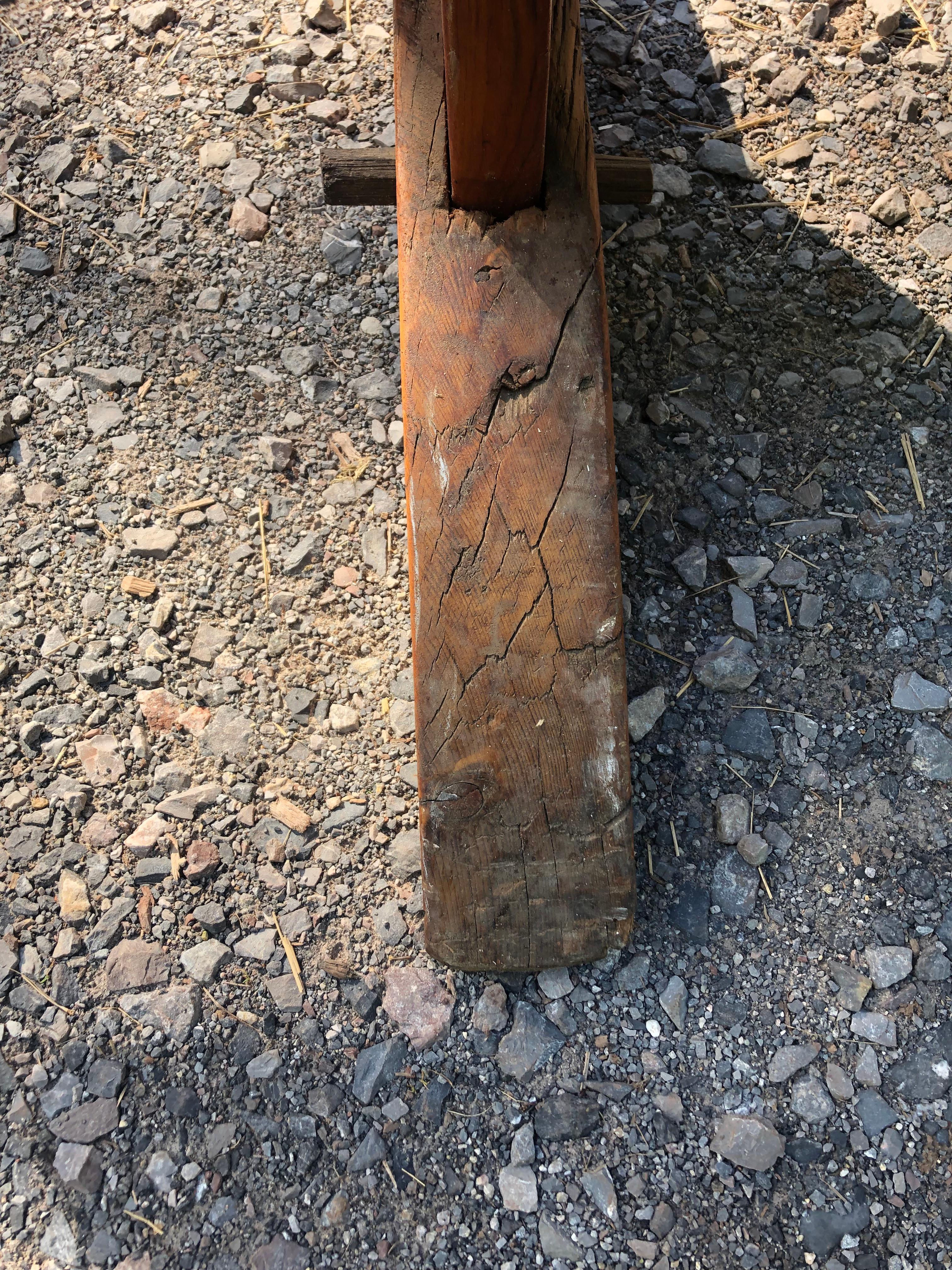 Oozing with Character Large Rustic Pine Farm Table with Hand Hewn Base For Sale 7