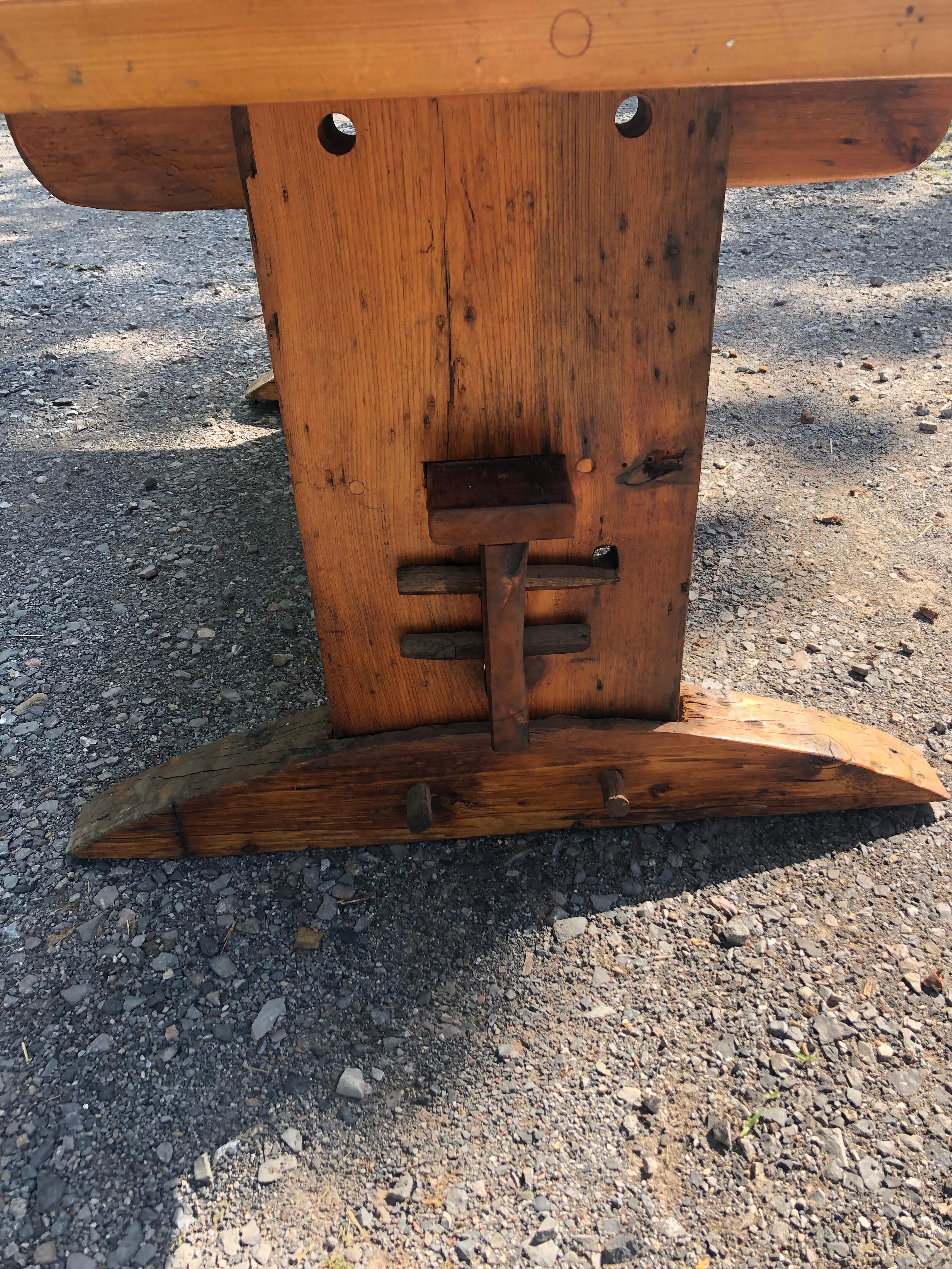 Oozing with Character Large Rustic Pine Farm Table with Hand Hewn Base In Good Condition For Sale In Hopewell, NJ