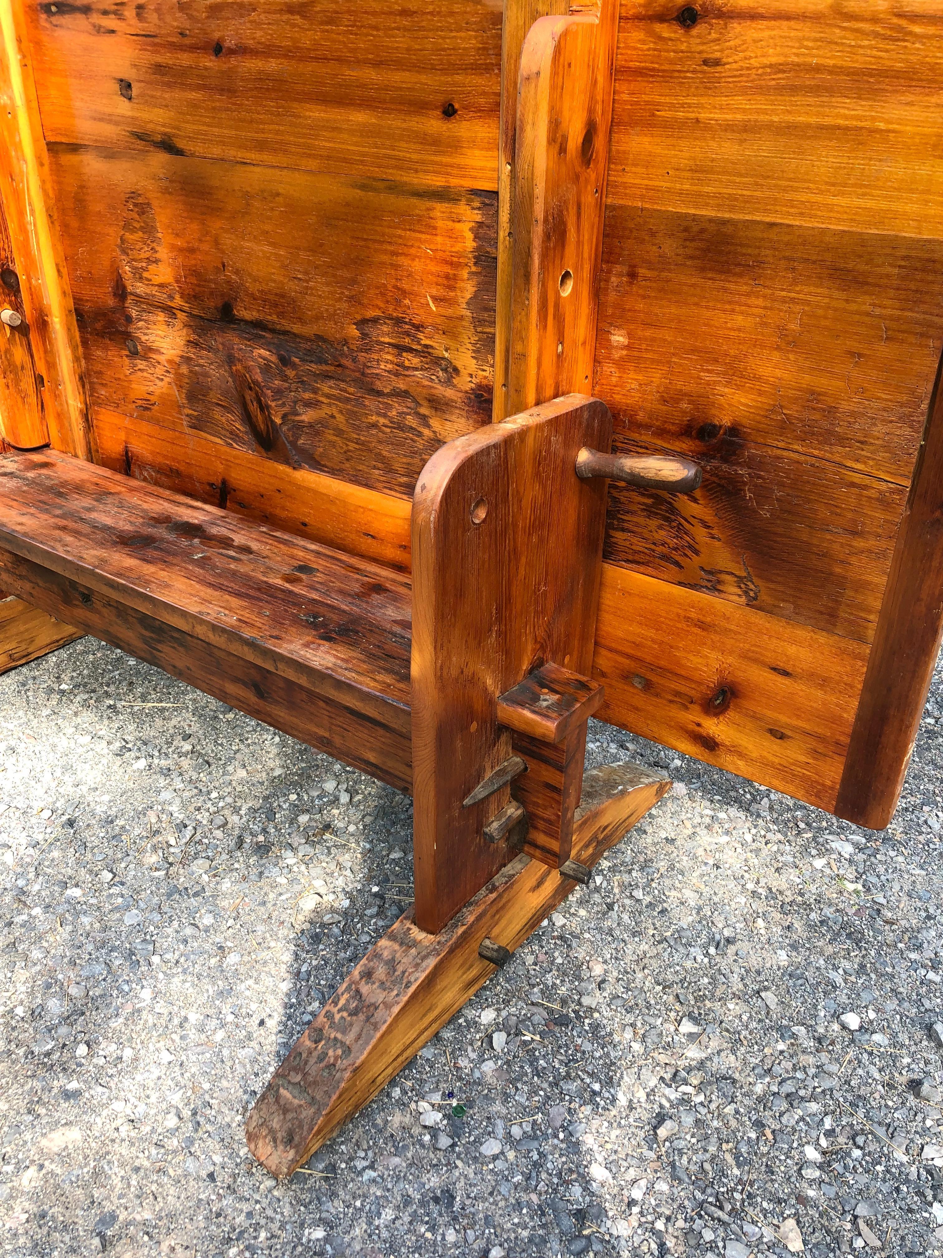 Mid-20th Century Oozing with Character Large Rustic Pine Farm Table with Hand Hewn Base For Sale