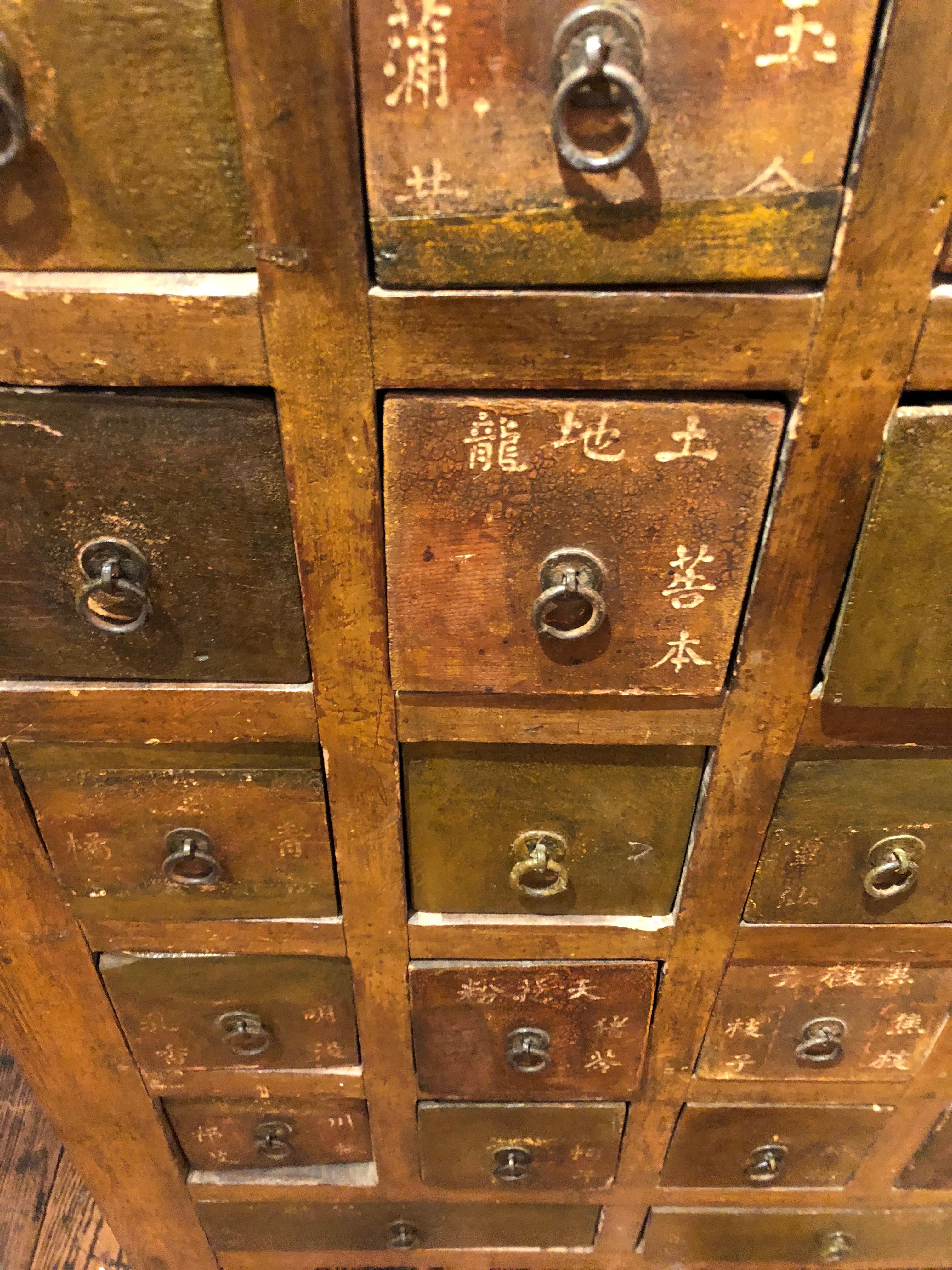 Oozing with Character Superb Antique Chinese Apothecary Cabinet In Distressed Condition In Hopewell, NJ