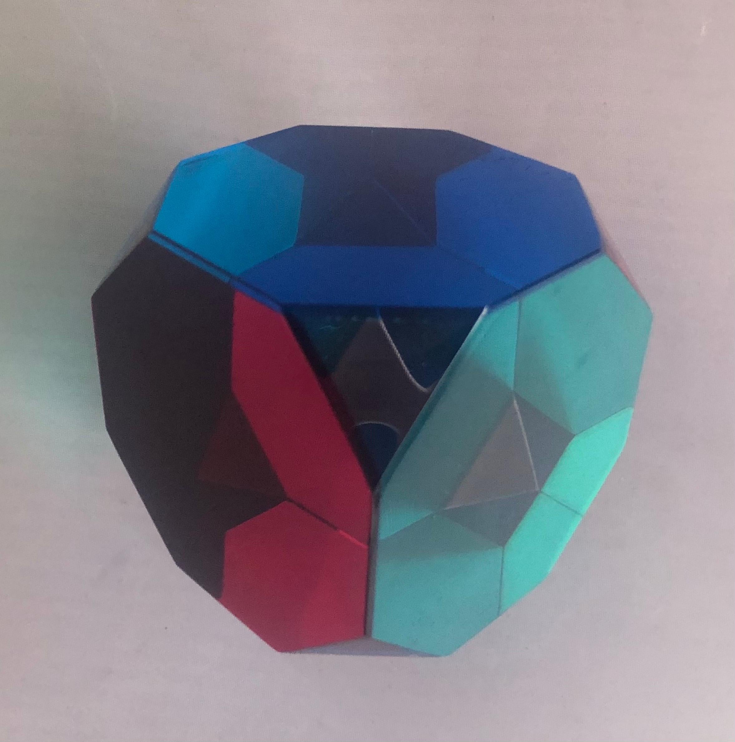 Op Art acrylic octagonal cube sculpture by Vasa Mihich, circa 1995. The optical look is changed by rotating the piece and letting the light refract at different angles; there are literally hundreds of different looks that can be created. The