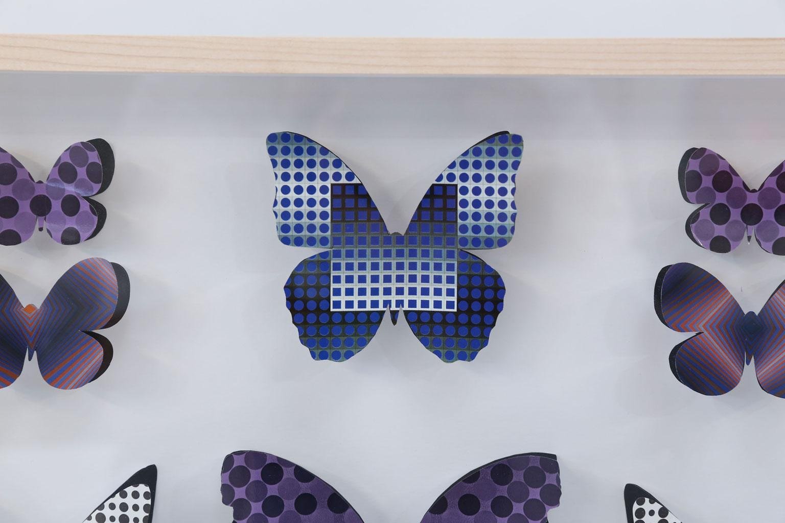 Op art butterfly box: vintage (circa 1960-1979) Op Art handcut into butterfly shapes and pinned within a shadow box as specimen. Framed in unfinished maple. Two more similar pieces available (ref: LU984716911381 and LU984716911321).