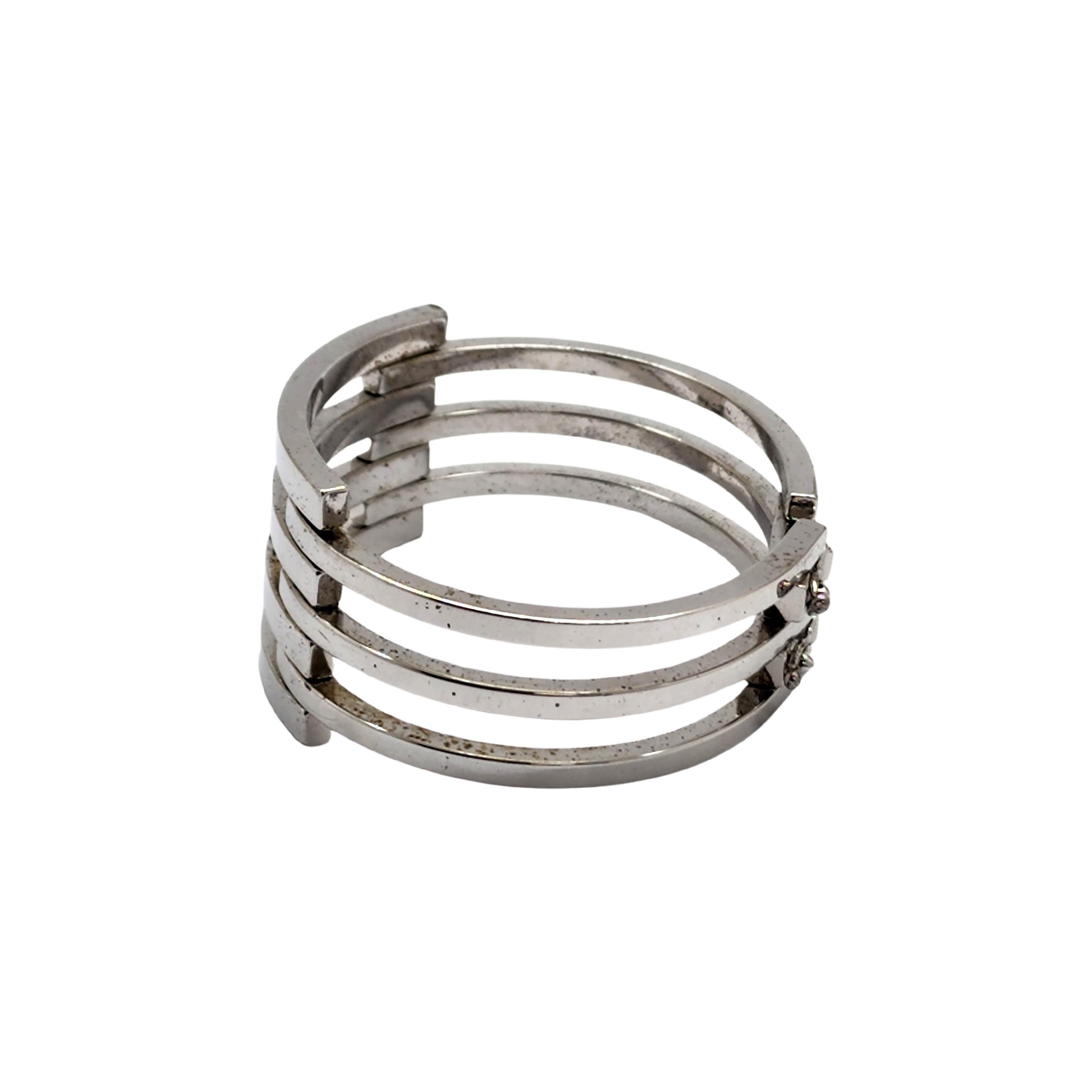 Sterling silver modernist open bar design hinged bangle bracelet by OP Orlandini of Italy.

Beautiful large and substantial Uno a Erre bracelet featuring bar design with double closure clasps with 2 safety clasps.

Measures 6 1/2