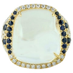Bague en or 18 carats avec opale et diamants