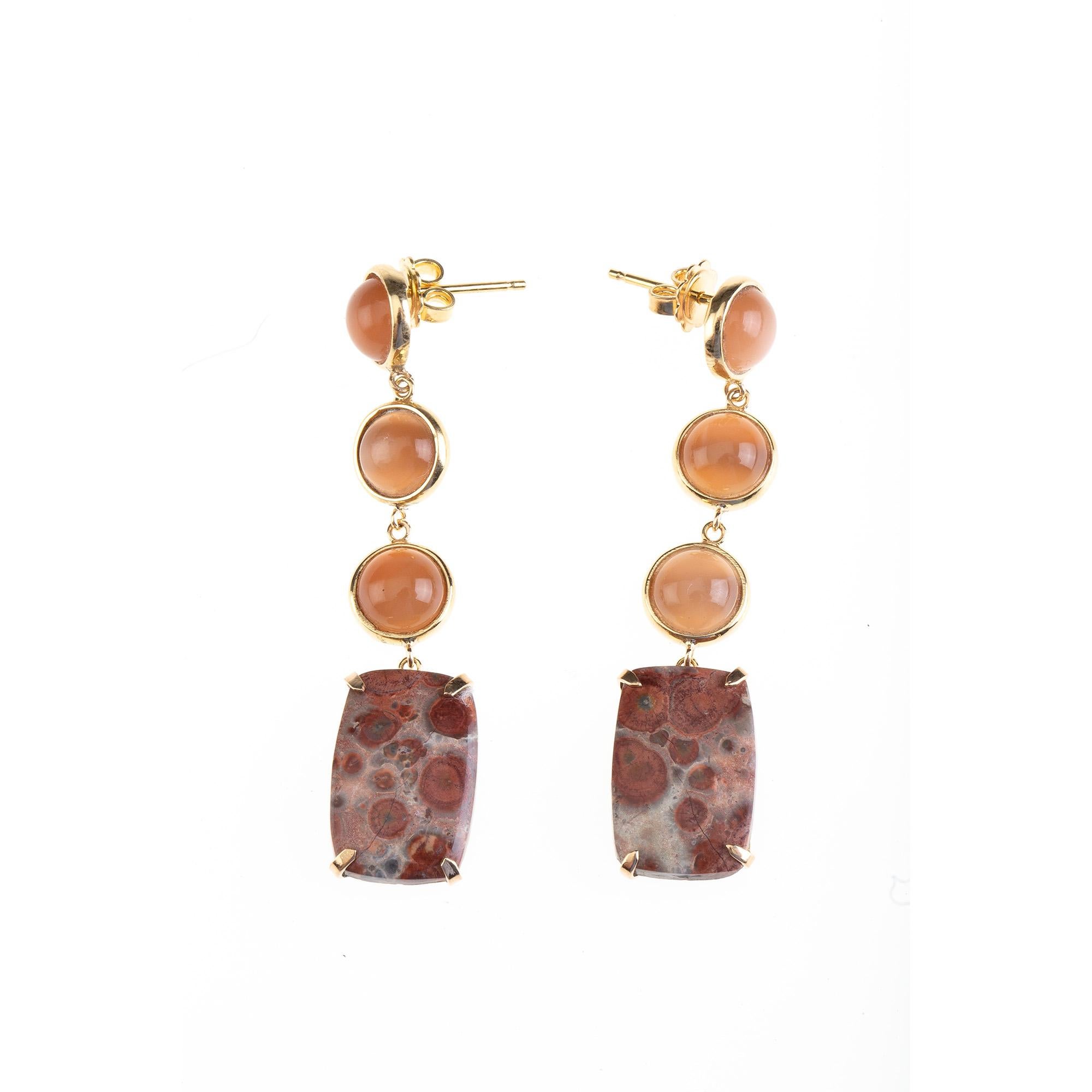 Cabochon fire opal 18 k Gold gr 10,20 Earrings with a Picasso jasper.
All Giulia Colussi jewelry is new and has never been previously owned or worn. Each item will arrive at your door beautifully gift wrapped in our boxes, put inside an elegant