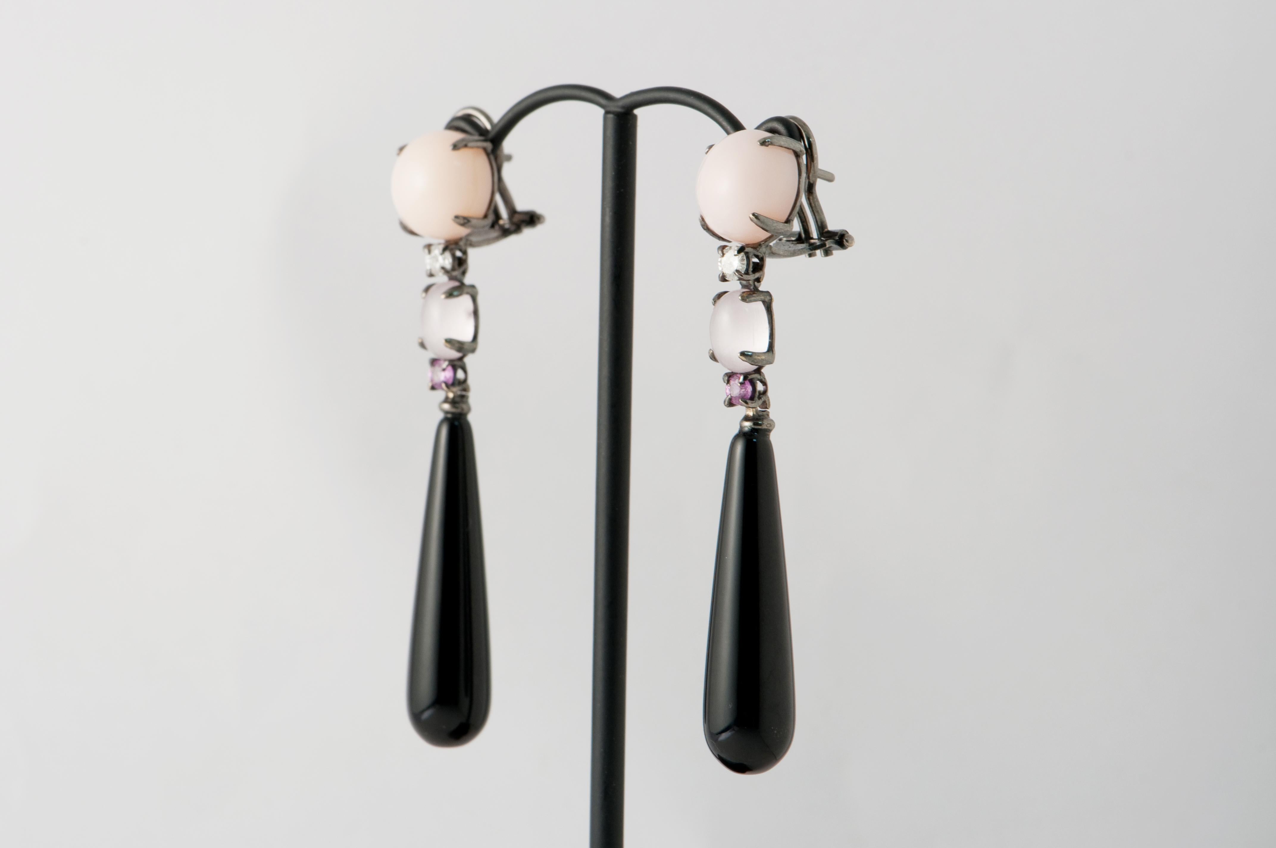 Discover this Opal, Agate, Coral
White Diamonds 0.014 ct
Black Gold 18 Carat Chandelier Earrings.
