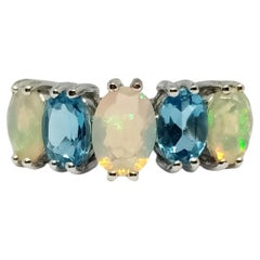 Opal and Blue topaz Ring