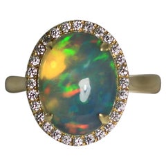 Opal and Diamond 14 Karat Yellow Gold Ring