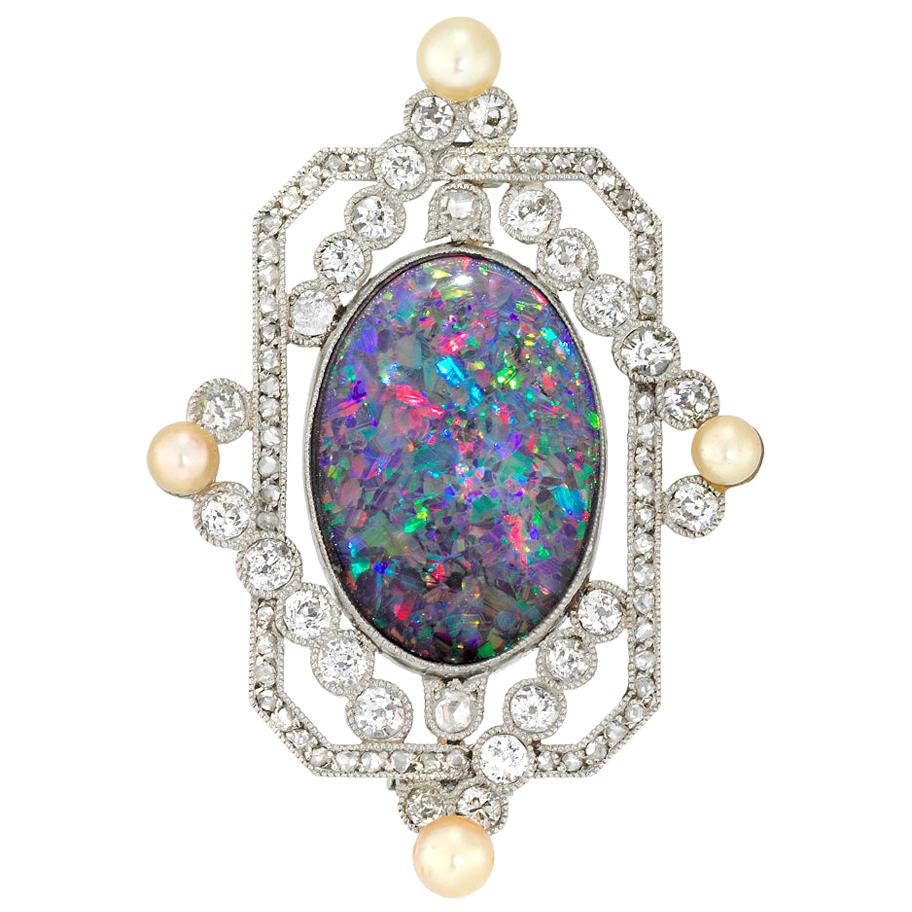 An Early 20th Century Opal And Diamond Brooch For Sale