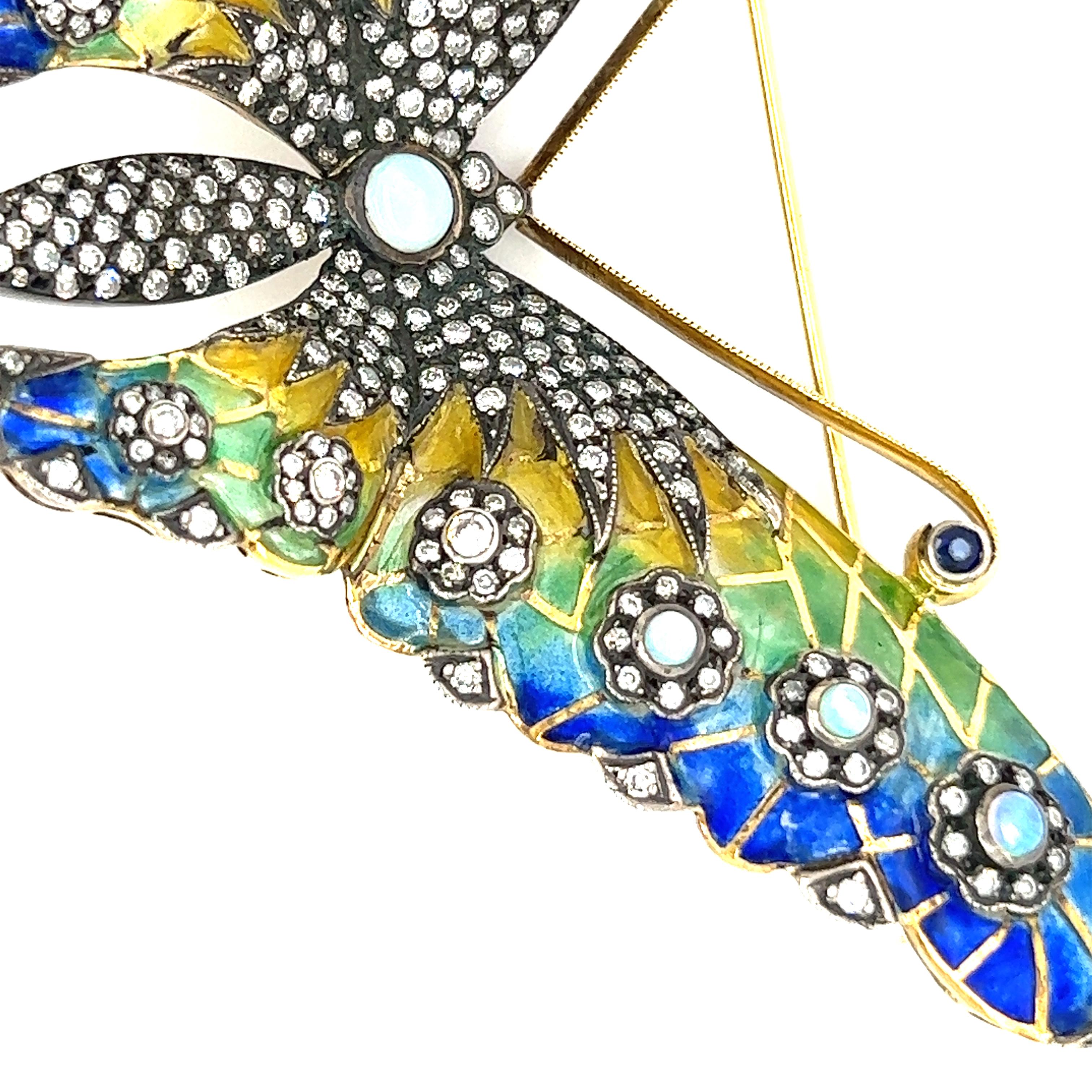 Exquisite enamel butterfly brooch with opals and approximately .85cts of diamonds. 

#61374