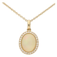 Opal and Diamond Cluster Halo Pendant Necklace Set in 18 Karat Yellow Gold