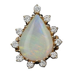 Opal and Diamond Halo Cocktail Ring, 14 Karat Gold Pear Cabochon .60 Carat