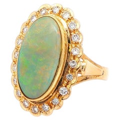 Opal and Diamond Halo Ring