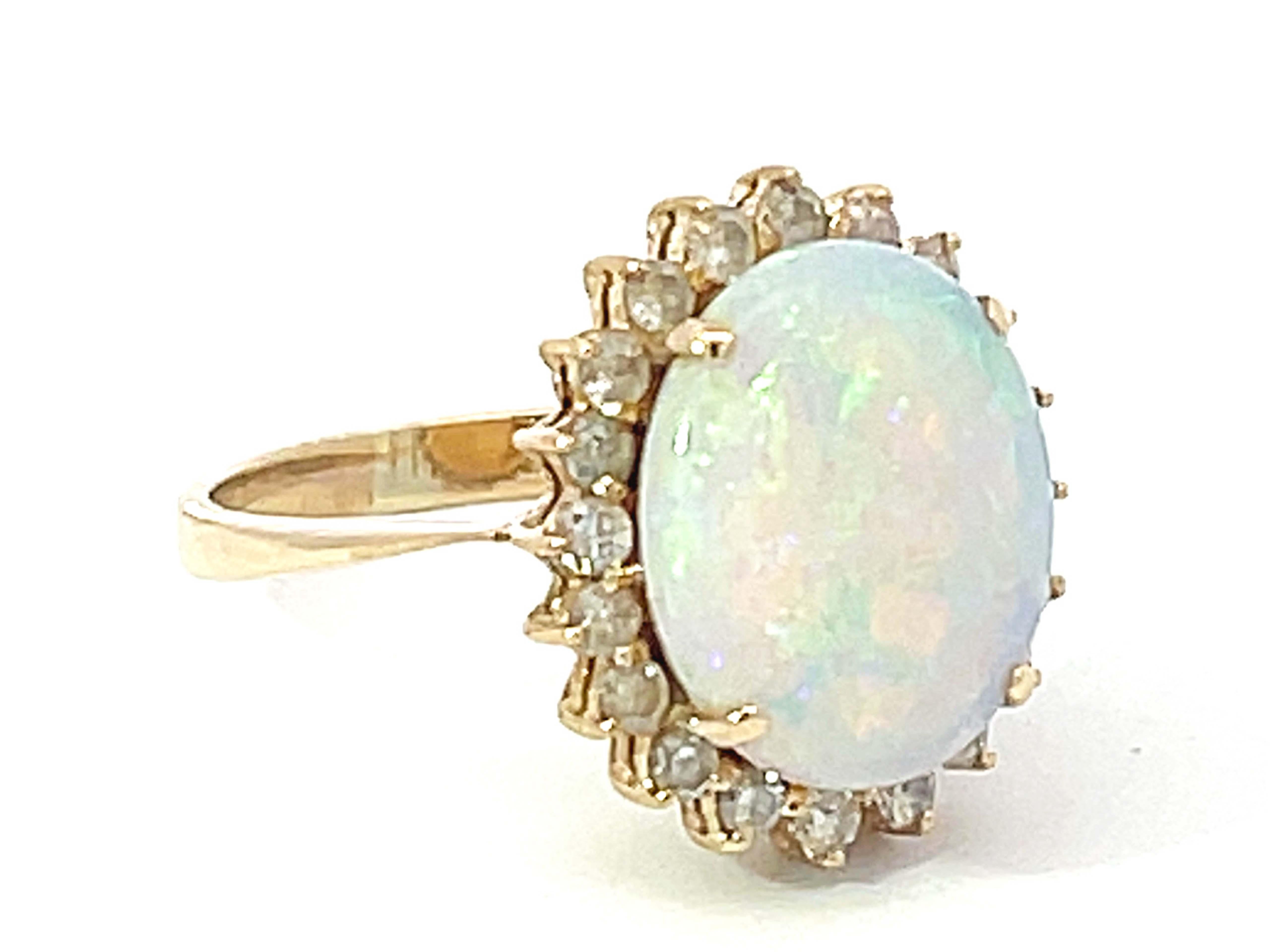 Modern Opal and Diamond Halo Ring in 14k Yellow Gold For Sale