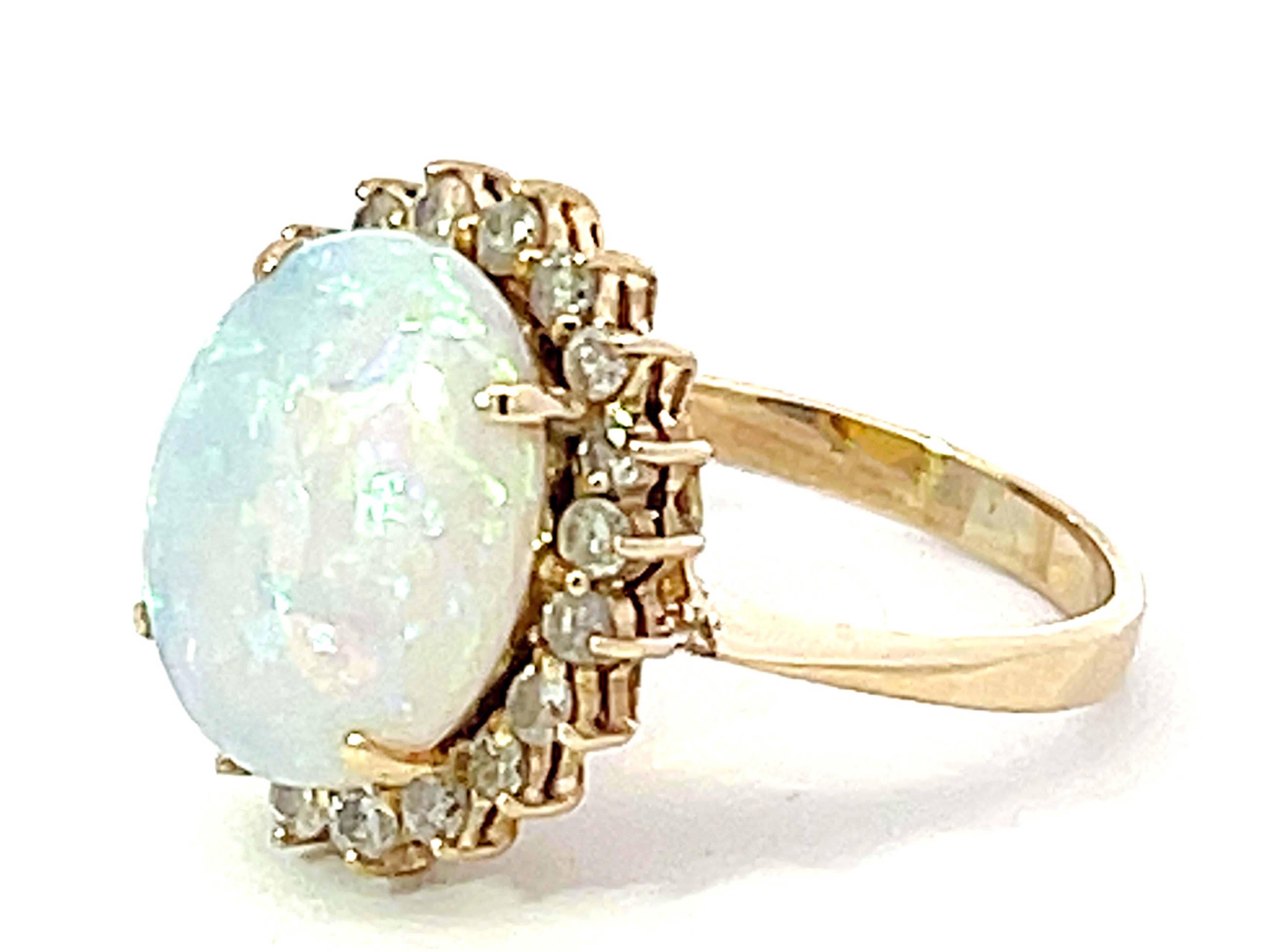 Cabochon Opal and Diamond Halo Ring in 14k Yellow Gold For Sale