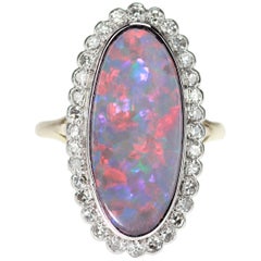 Opal and Diamond, Oval Shape Cluster Ring in Rub over Setting in 18 Karat Gold