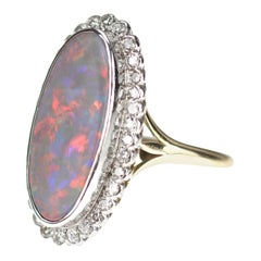 Opal and Diamond, Oval Shape Cluster Ring in Rub over Setting in 18 Karat Gold