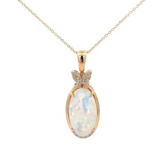 Collier pendentif opale et diamant en or jaune 14K
