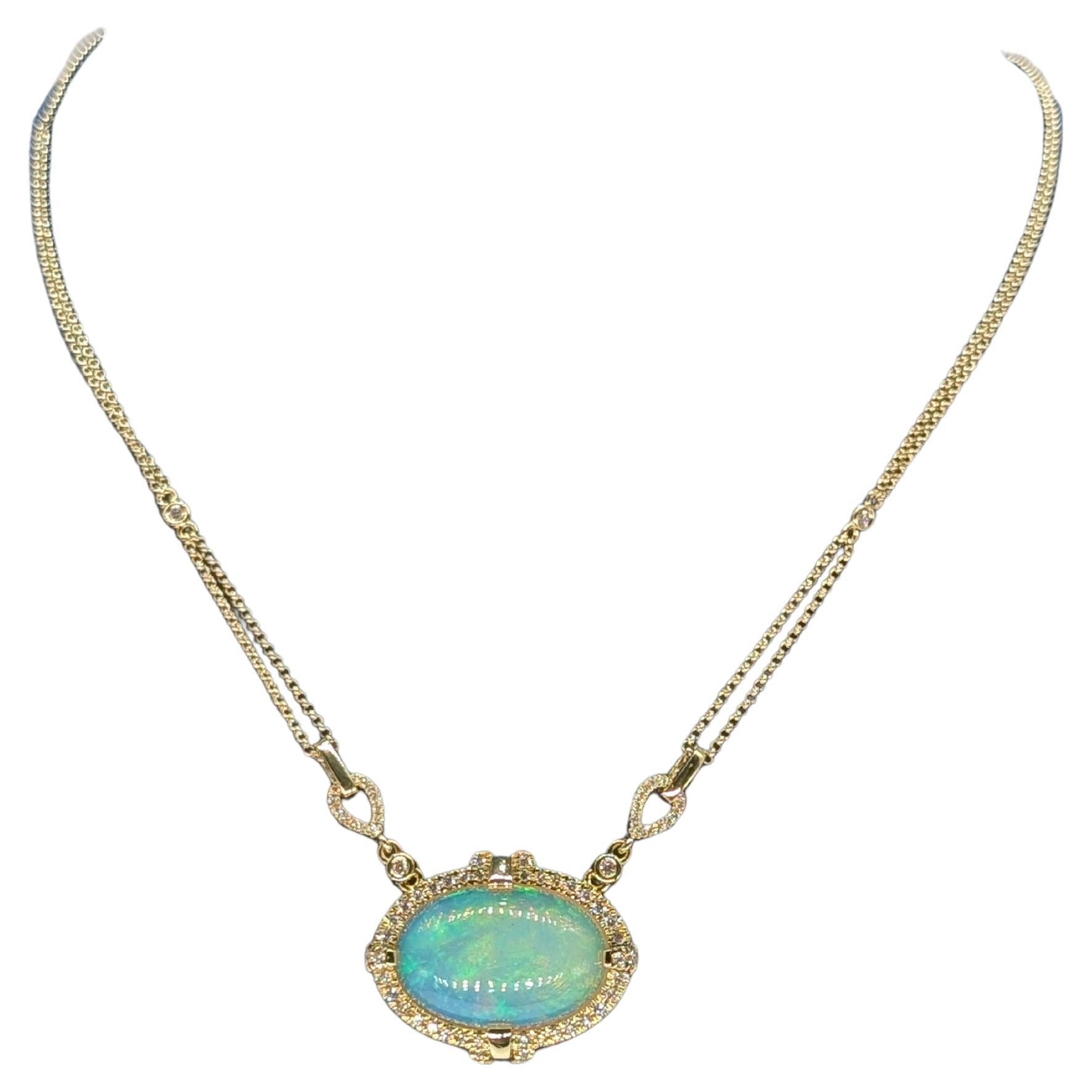 Ciondolo con opale e diamante su collana in oro giallo 14k