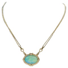 Opal und Diamant-Anhänger auf 14k Gelbgold Halskette