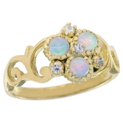 Bague florale de style vintage en or jaune massif 9 carats avec opale et diamants