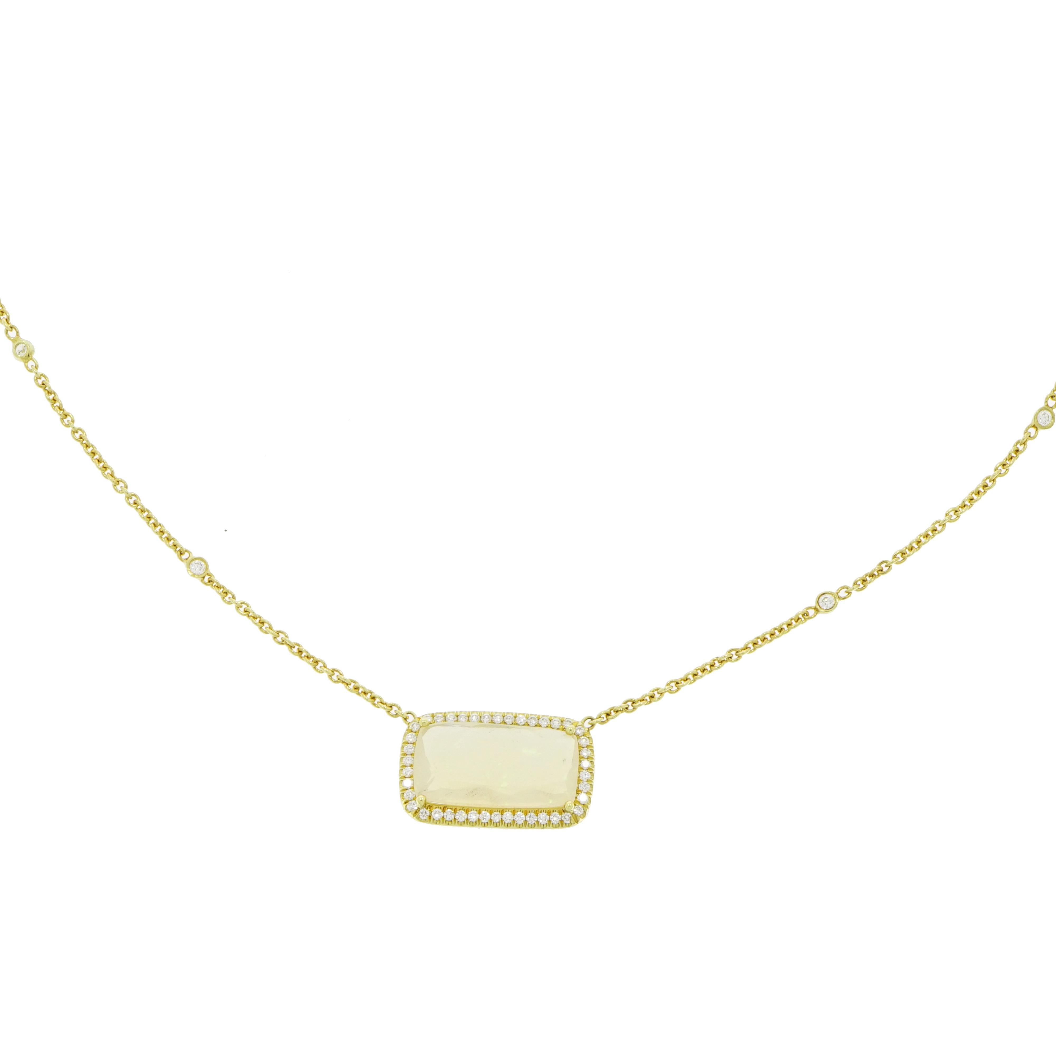 Layering a gold chain is the key to a chic summer look. This rectangular Opal and Diamond Necklace is well suited to delicately layer. 
Designed and crafted in NYC in 18k yellow gold centering a 4.26 carat rectangular shaped Opal surrounded by 0.36