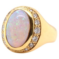 Retro Opal and diamonds ring in 18k yellow gold